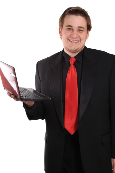 Homem com computador portátil pequeno — Fotografia de Stock