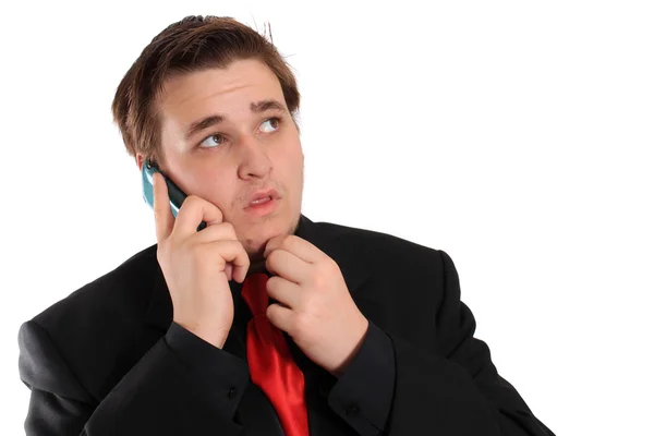 Young businessman in black with cellphone — Stock Photo, Image