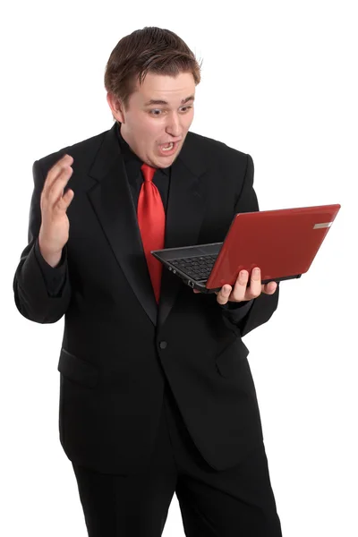 Man with small computer laptop Stock Image
