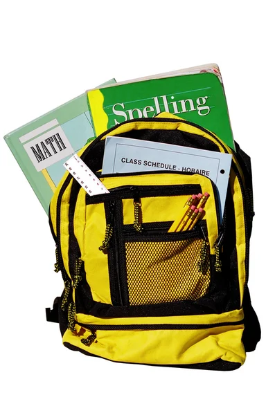 Школьная сумка, полная книг — стоковое фото