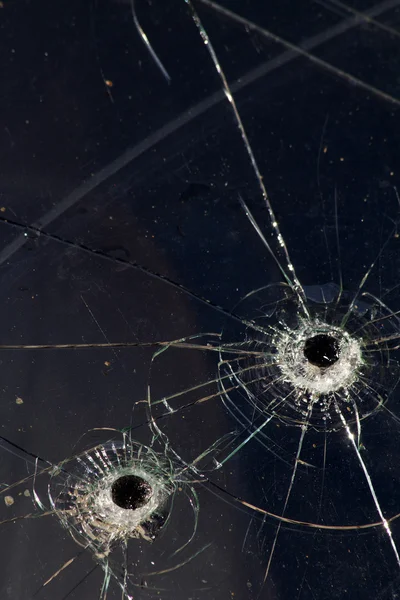 Hole glass broken shot — Stock Photo, Image