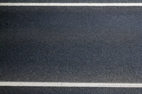 Асфальтована лінія поверхні дороги Стокове Фото