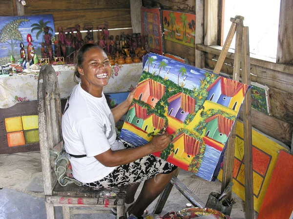 stock image Painter Shows her Canvas in a Shop of Santo Domingo