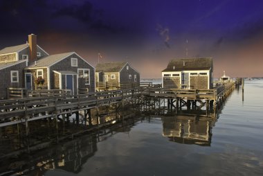 Homes over Water in Nantucket at Sunset, Massachusetts clipart