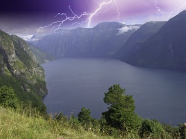 Panoramic view of Geiranger Fjord during a Storm clipart