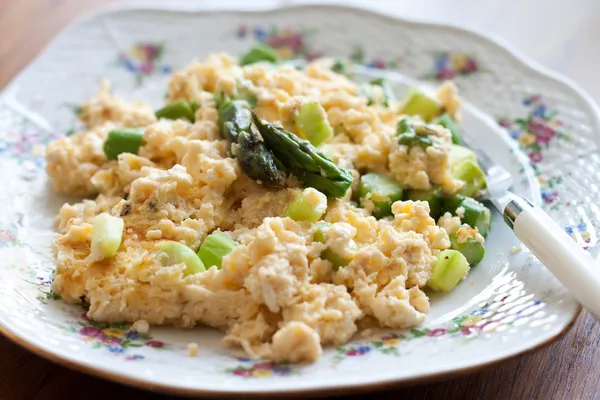 Scrambled eggs with asparagus Stock Picture