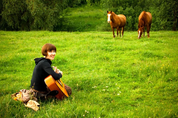 Девочка и лошади — стоковое фото