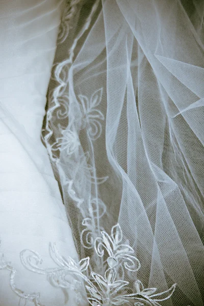 Abstraktní zblízka střílel svatebních šatů — Stock fotografie