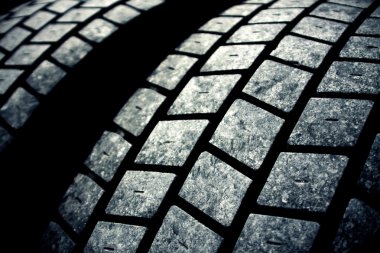 Used tires dark background clipart