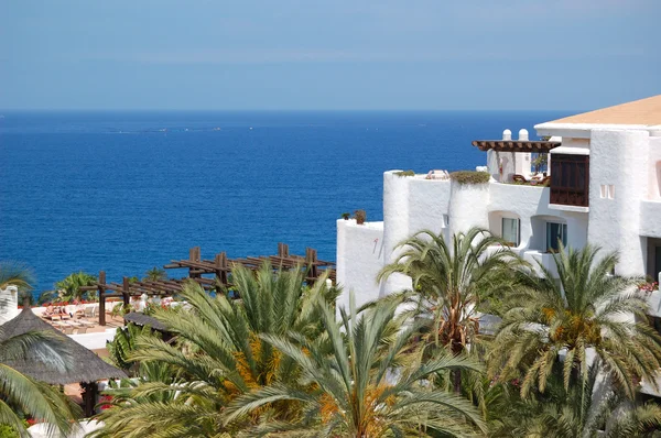 View on the beach, palms and building of luxury hotel, Tenerife — Stock Photo, Image