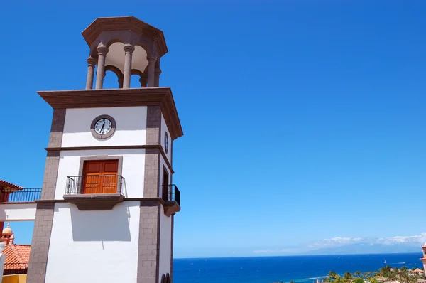 Tower with clock at the luxury hotel, Tenerife island, Spain — Stock Photo, Image