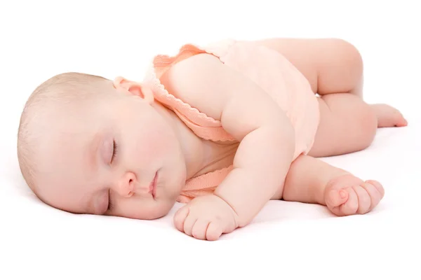 Bambino dorme su uno sfondo bianco . — Foto Stock