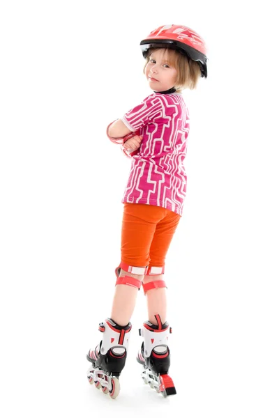 Een meisje op rolschaatsen. — Stockfoto
