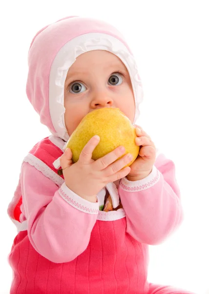 Criança come em um fundo branco . — Fotografia de Stock