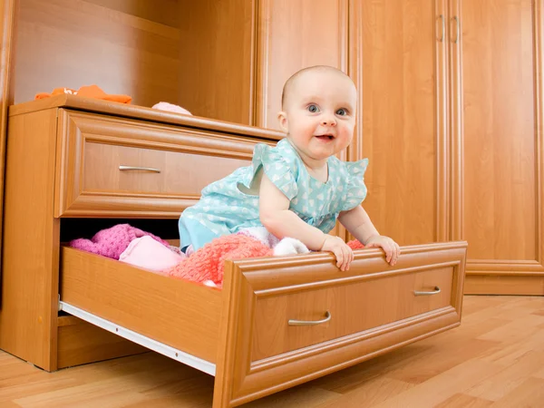 stock image Baby was sitting in the closet.