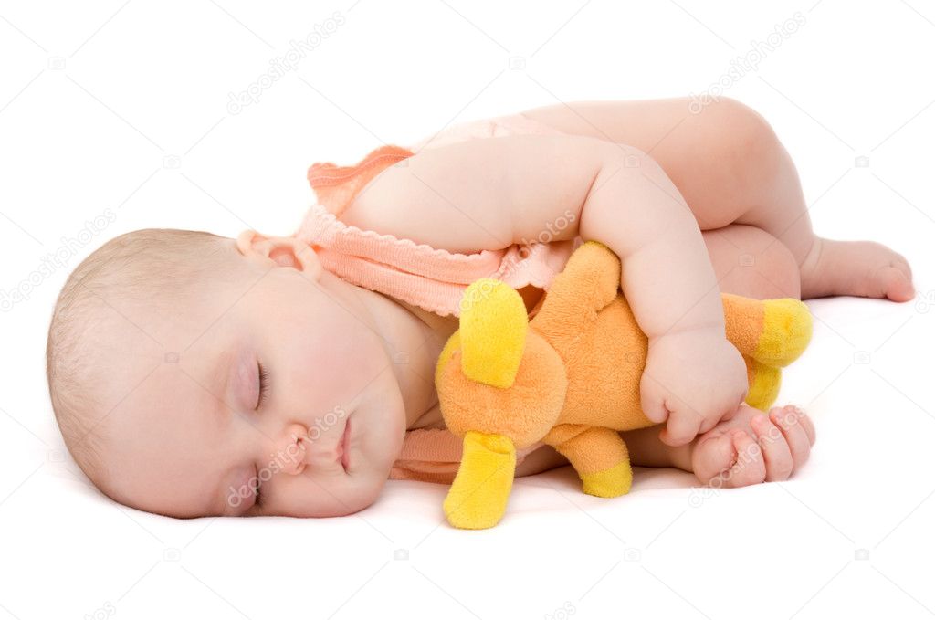 Baby sleeps on a white background.