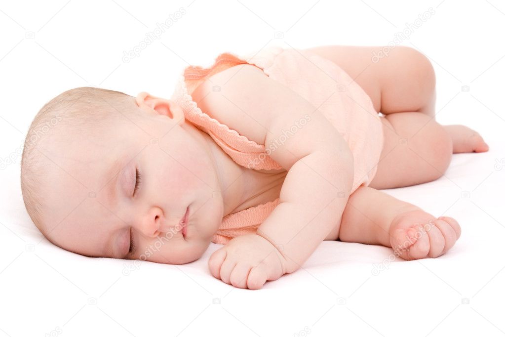 Baby sleeps on a white background.