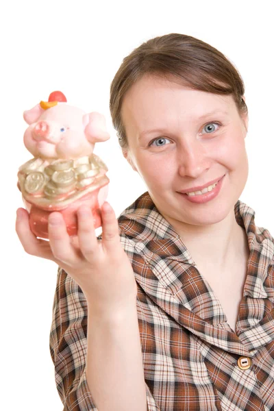 Mulher com banco porquinho no fundo branco . — Fotografia de Stock