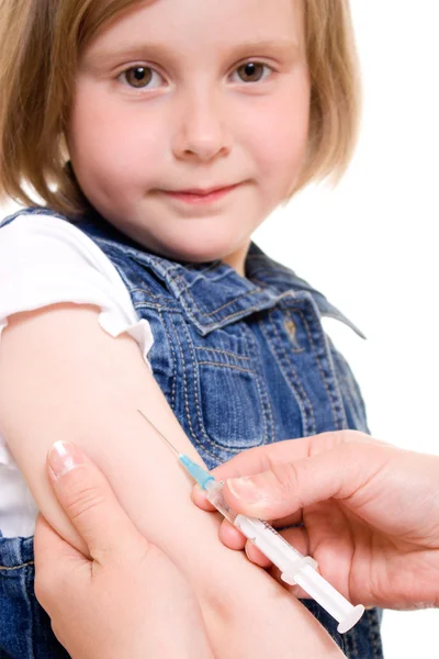 Očkování dítěte na bílém pozadí. — Stock fotografie
