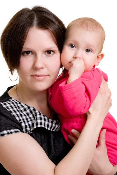Mãe com um bebê em um fundo branco — Fotografia de Stock