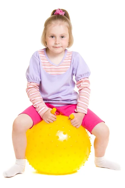 Girl with a ball on a white background. — Stock Photo, Image
