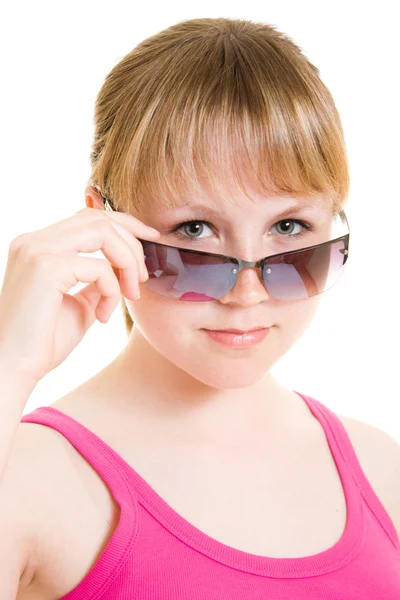 Nastolatka w okulary na białym tle. — Zdjęcie stockowe