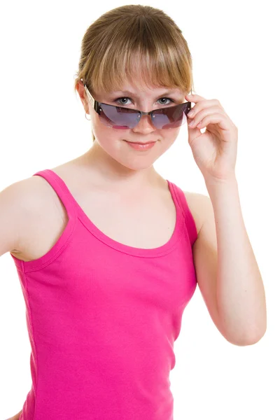 Adolescente en gafas de sol sobre fondo blanco . — Foto de Stock
