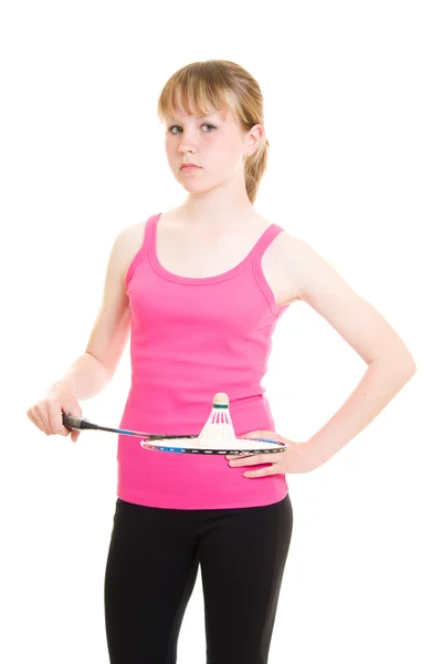Chica con una raqueta sobre un fondo blanco . — Foto de Stock