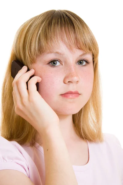Το κορίτσι με το τηλέφωνο σε λευκό φόντο. — Φωτογραφία Αρχείου