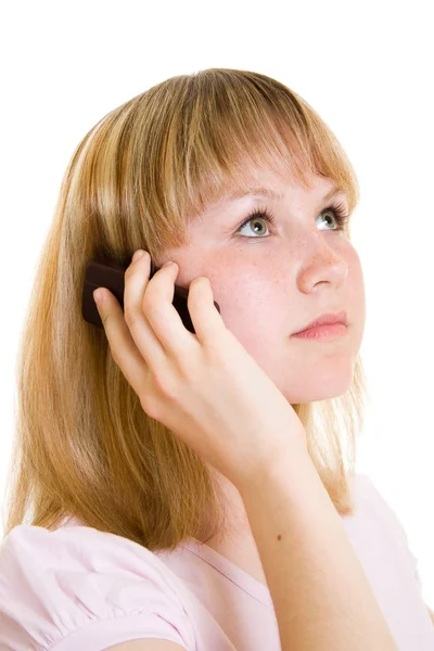 Das Mädchen mit dem Telefon auf weißem Hintergrund. — Stockfoto