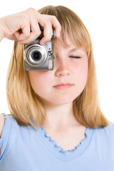 A teenager with a camera on a white background. — Stock Photo, Image