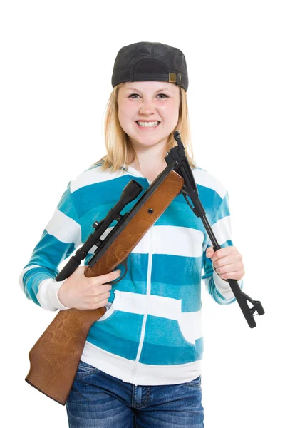Un adolescente con un arma sobre un fondo blanco . —  Fotos de Stock