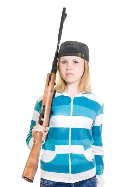 Een tiener met een kanon op een witte achtergrond. — Stockfoto