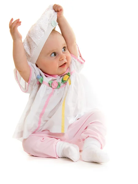 Bebê vestido em um fundo branco . — Fotografia de Stock