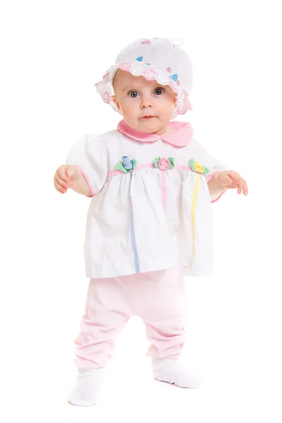 Baby im Kleid auf weißem Hintergrund. — Stockfoto