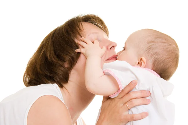 Madre con un bebé sobre un fondo blanco —  Fotos de Stock