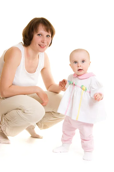 Madre con un bebé sobre un fondo blanco — Foto de Stock