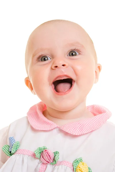 Bebê sorridente em um fundo branco . — Fotografia de Stock