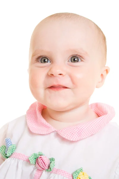Bébé souriant sur fond blanc . — Photo