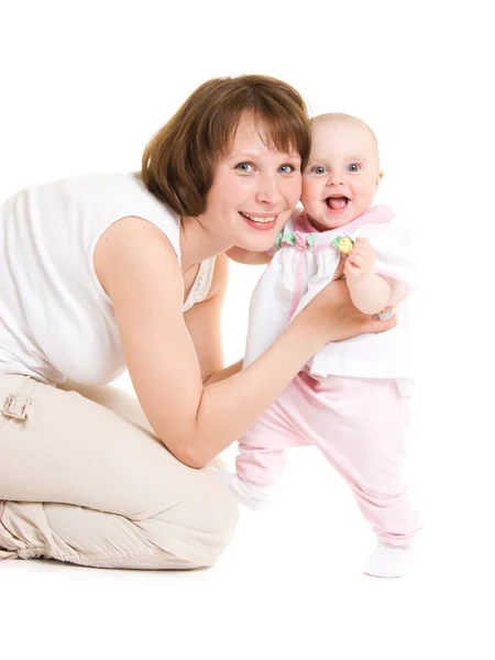 Mãe com um bebê em um fundo branco . — Fotografia de Stock