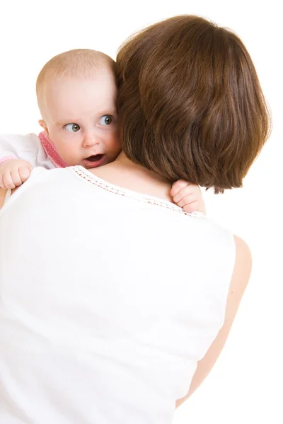 Moeder met een baby op een witte achtergrond. — Stockfoto