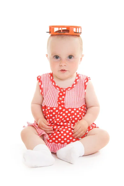 Baby im Kleid auf weißem Hintergrund. — Stockfoto