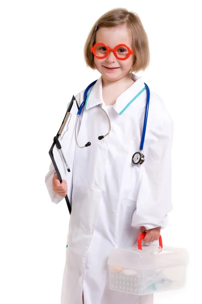 Kleiner Arzt mit weißem Hintergrund. Stockfoto