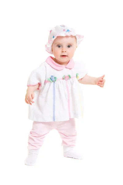 Baby in dress on a white background. Royalty Free Stock Photos