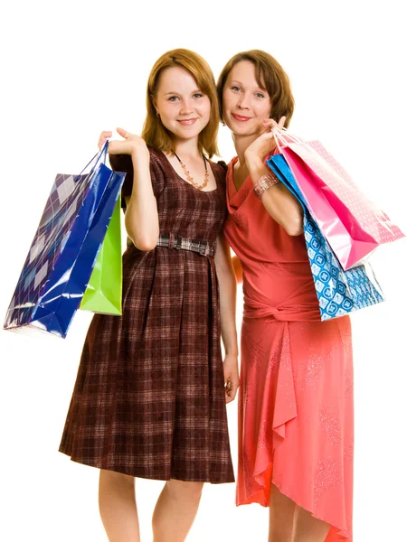 Meninas com compras em fundo branco . — Fotografia de Stock
