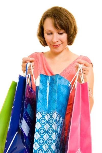 Girl with shopping on white background. — Stock Photo, Image