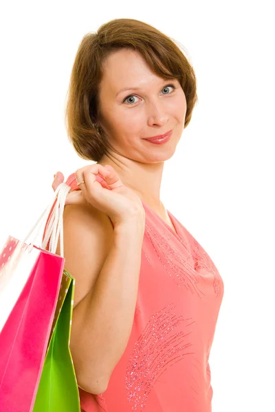 Meisje met winkelen op witte achtergrond. — Stockfoto