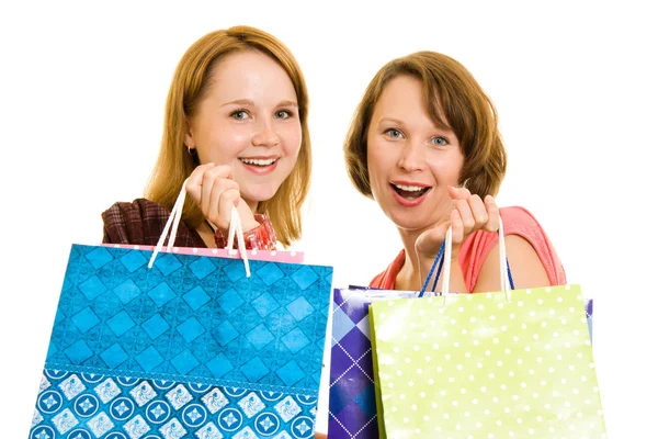 Girls with shopping on white background. — Stock Photo, Image