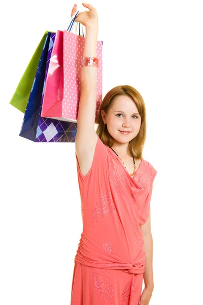 Κορίτσι με ψώνια σε άσπρο φόντο. — Φωτογραφία Αρχείου