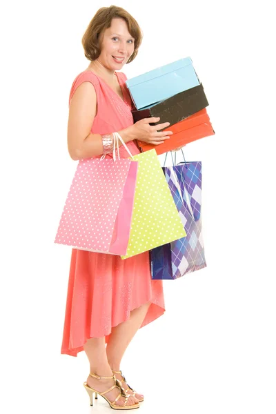 Girl with shopping on white background. — Stock Photo, Image